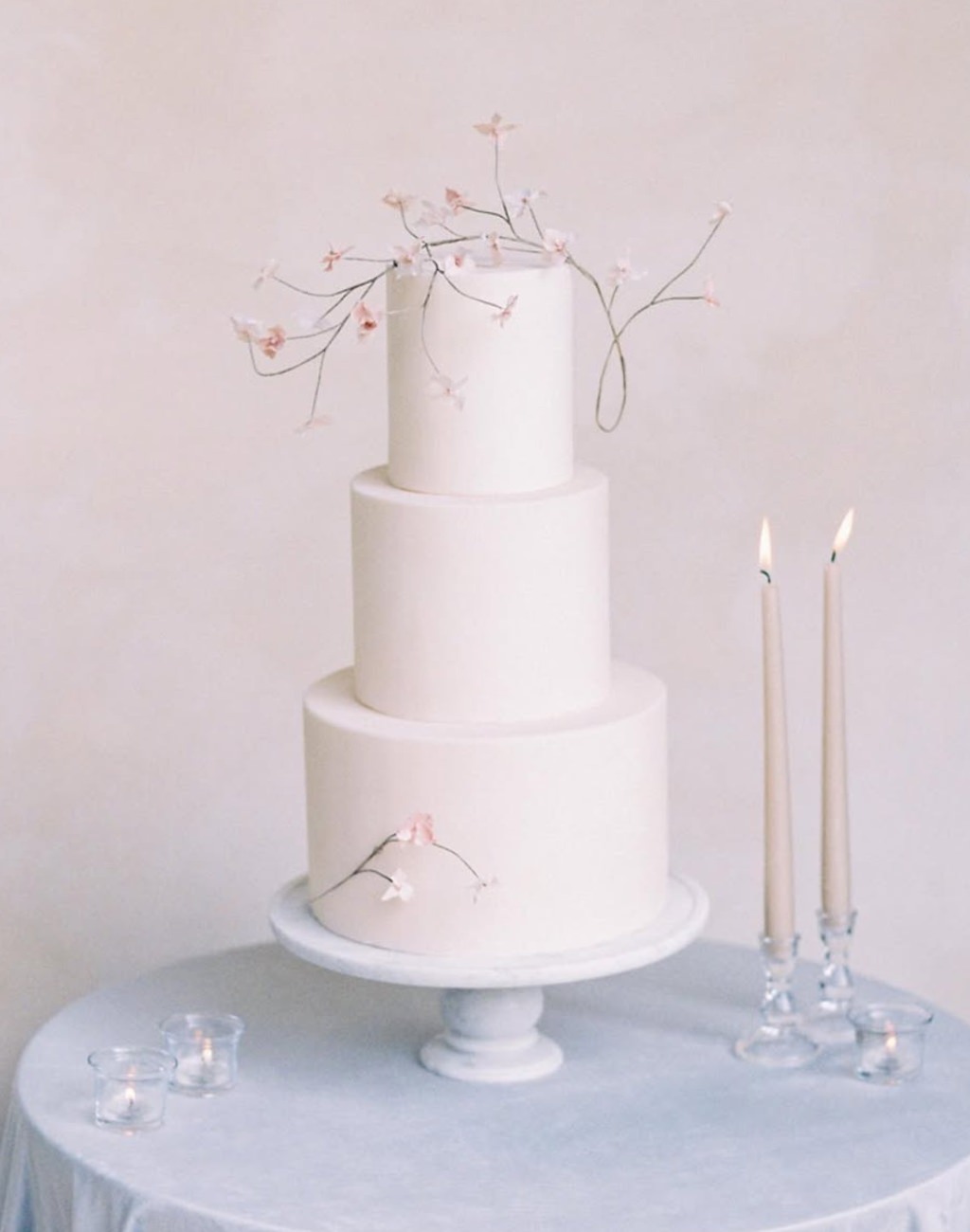 A pretty white 3-tier wedding cake