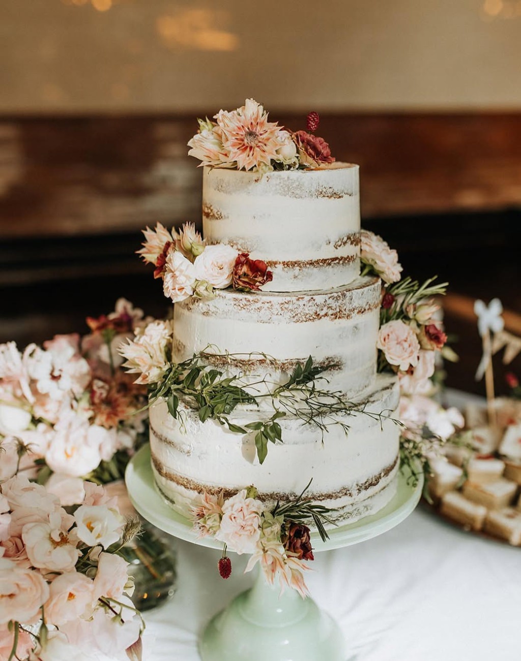 A rustic semi-naked 3-tier wedding cake