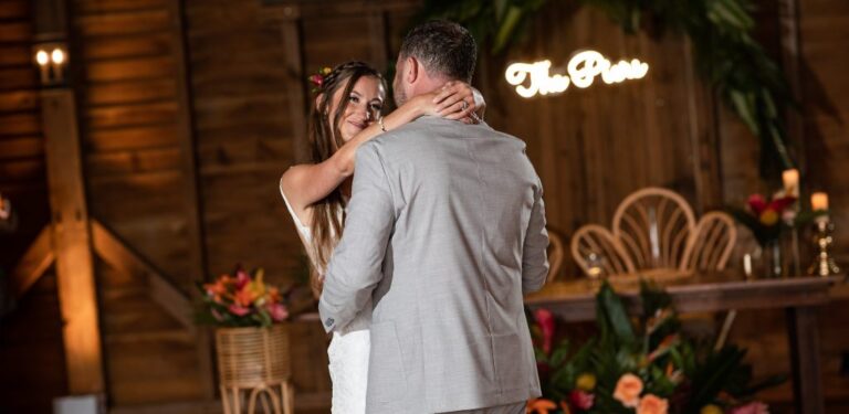 A bride and groom dancing at their wedding reception. This is for the post called unique first dance songs