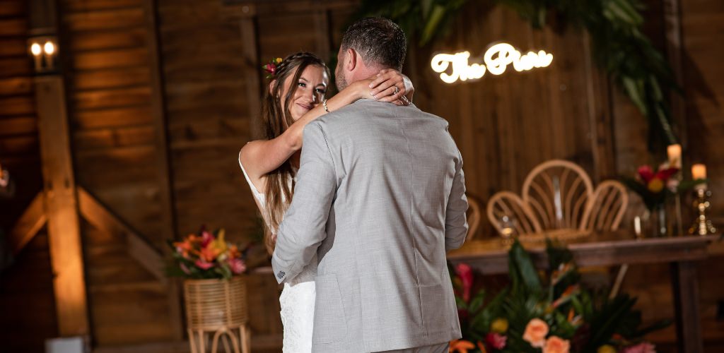 A bride and groom dancing at their wedding reception. This is for the post called unique first dance songs