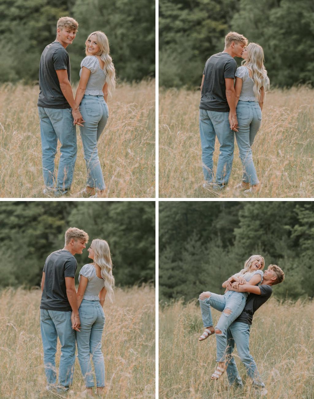 engagement photos in a field with the couple wearing jeans