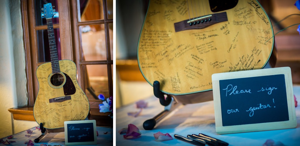 An acoustic guitar being used as a personalized wedding guest book