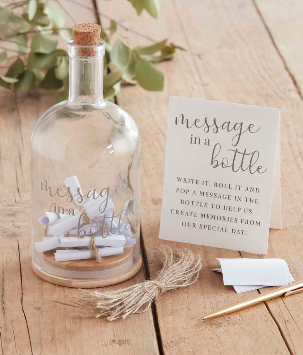 A message in the bottle guest book alternative where wedding guests sign little notes and roll them up....then stick them in the bottle for the couple to read later.