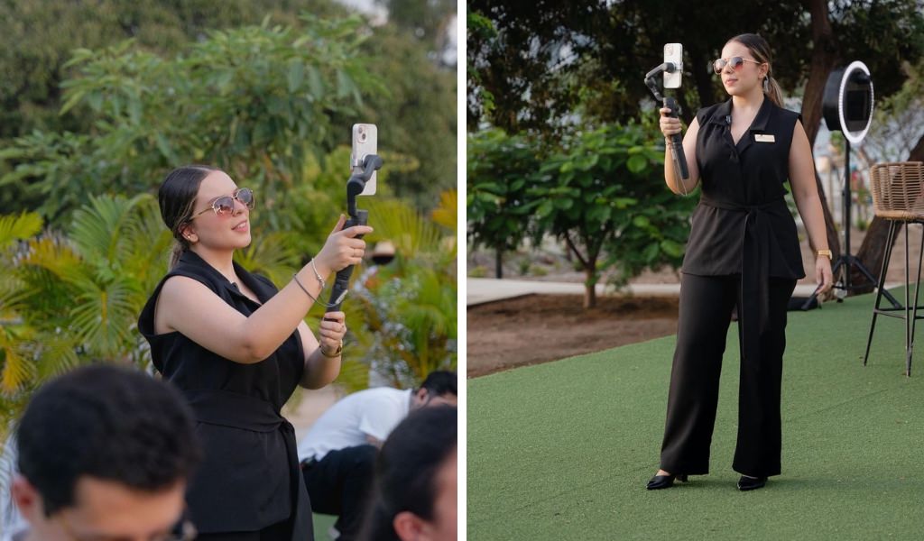 A woman wedding content creator filming wedding footage on her iPhone