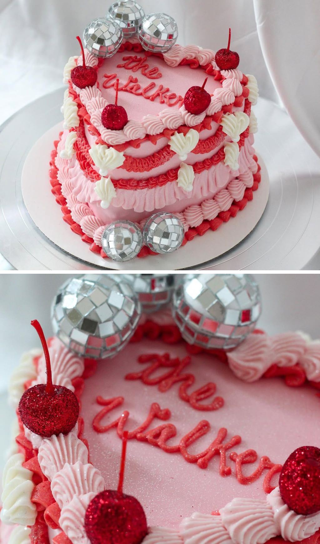 A pink retro heart-shaped wedding cake with cherries and disco balls