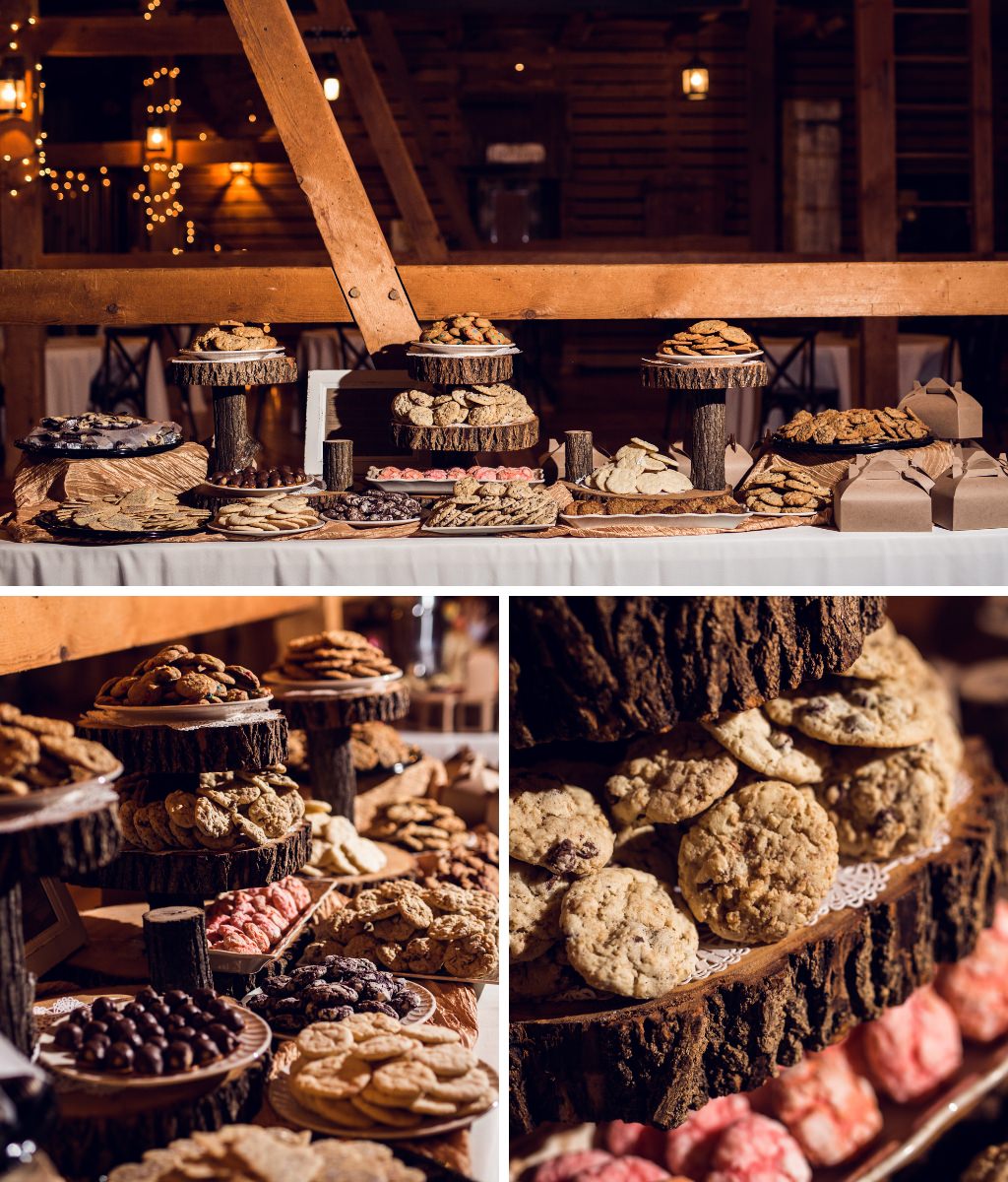 A wedding cookie table set up in a barn for a rustic wedding reception