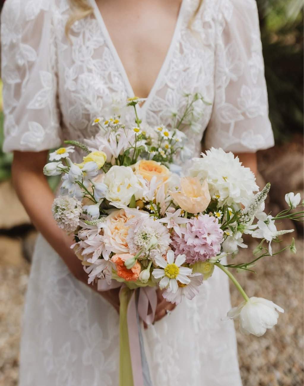 A spring wedding bouquet with lavender and white flowers