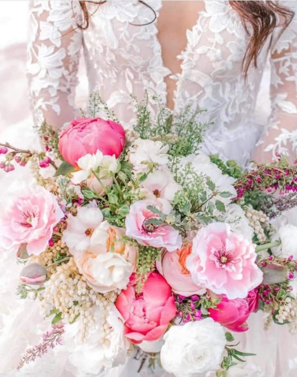 A spring wedding bouquet with pink peonies