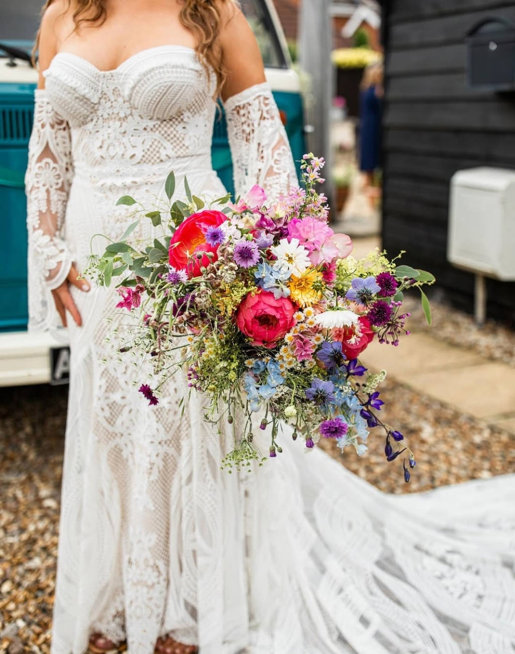 A pretty rustic boho-style spring wedding bouquet with wildflowers
