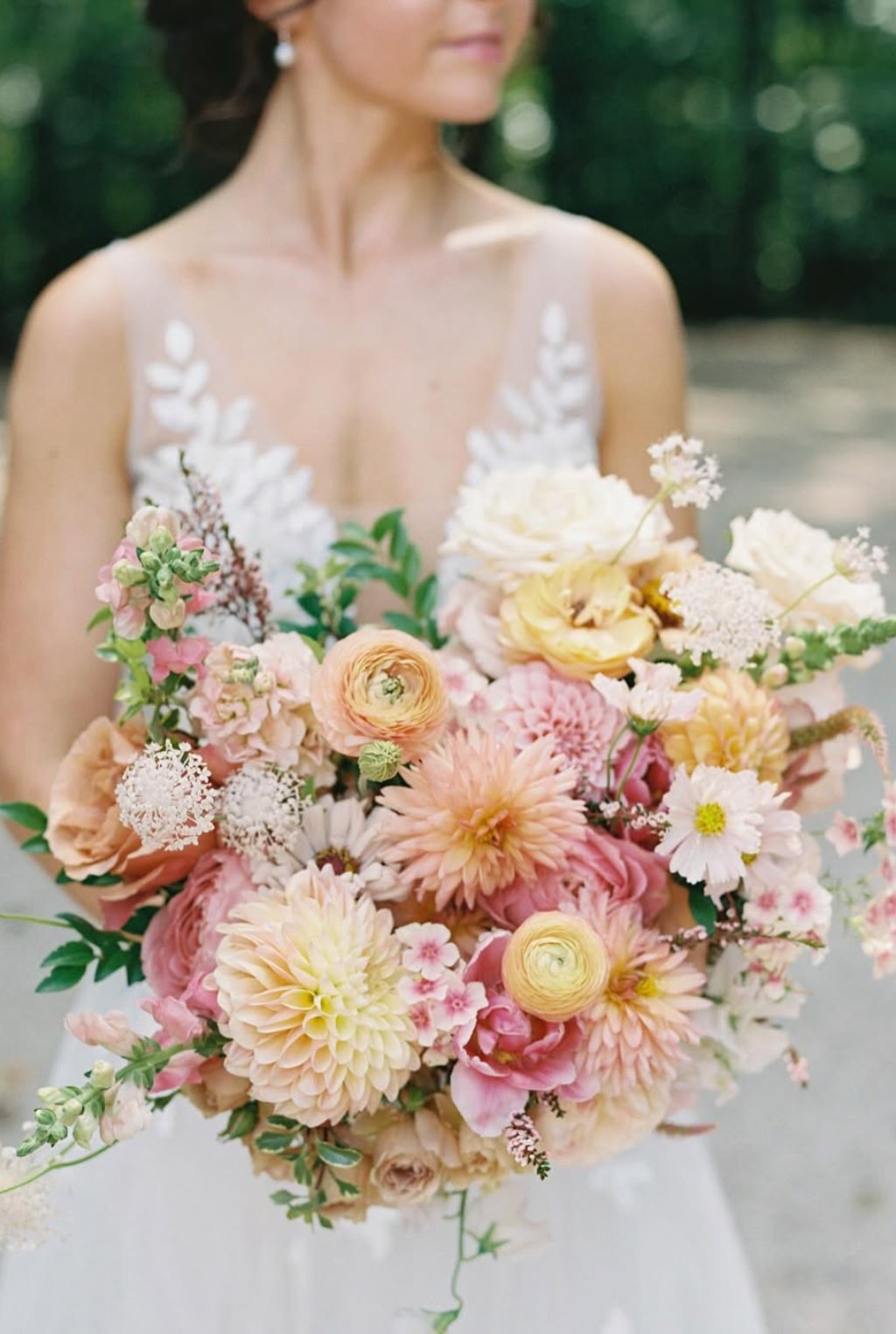 A light toned fall wedding bouquet for the bride