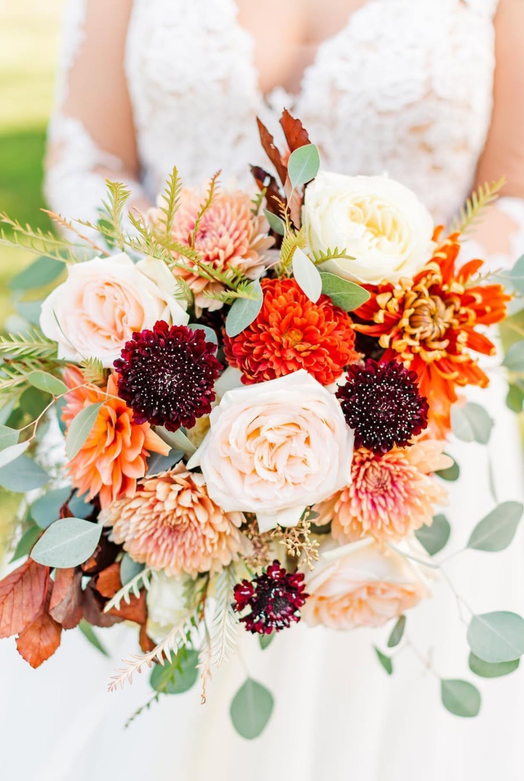 A bright fall wedding bouquet for the bride