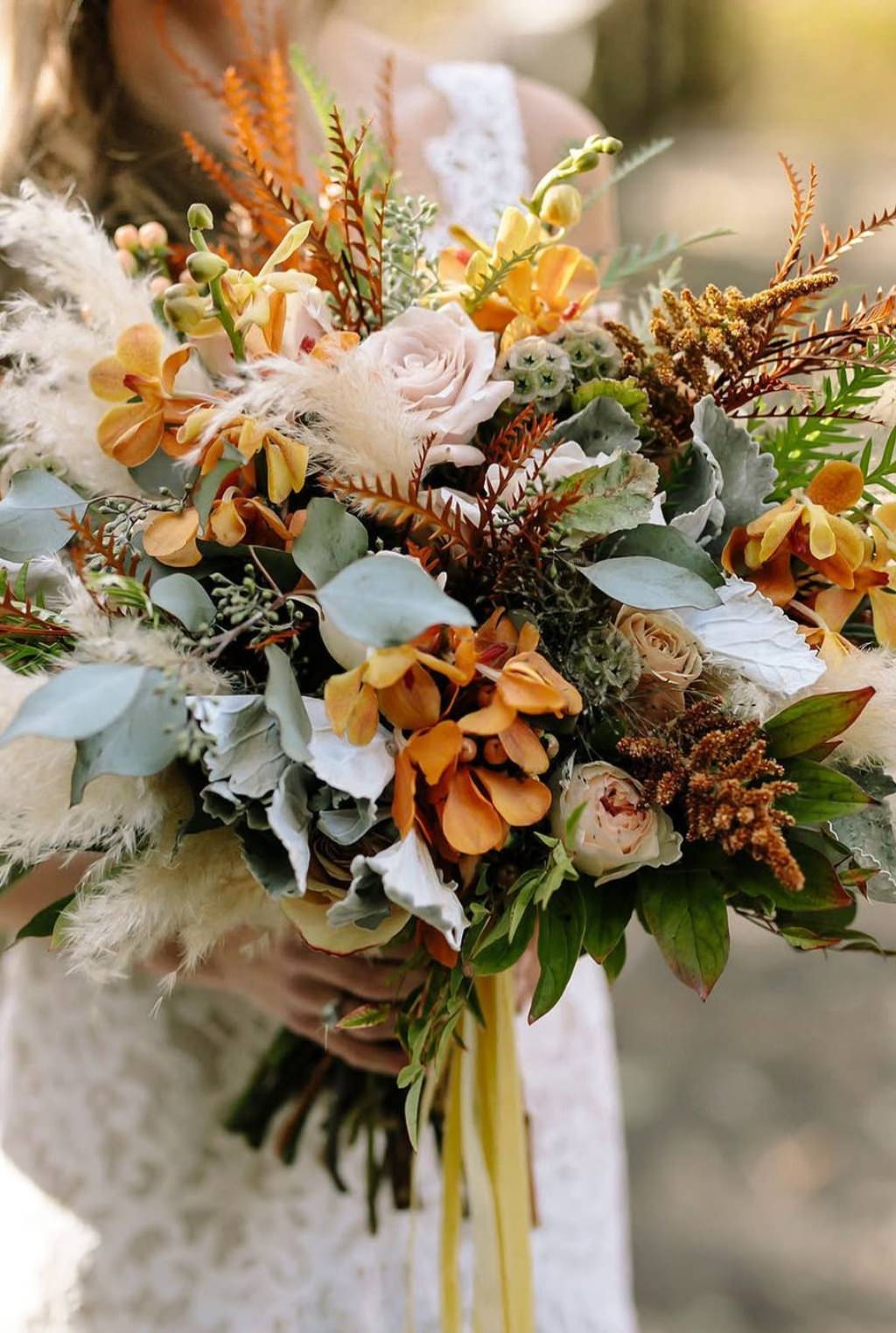 A big beautiful fall wedding bouquet for the bride